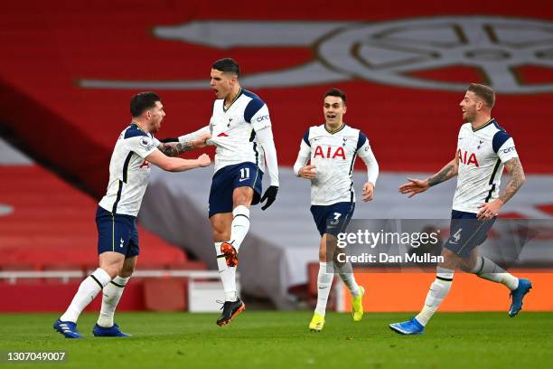 Erik Lamela of Tottenham Hotspur celebrates with team mates Pierre-Emile Hojbjerg, Sergio Reguilon and Toby Alderweireld after scoring their side's...