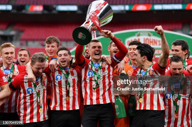 Max Power of Sunderland and team mates celebrate with the Papa John's Trophy after the Papa John's Trophy Final match between Sunderland and Tranmere...