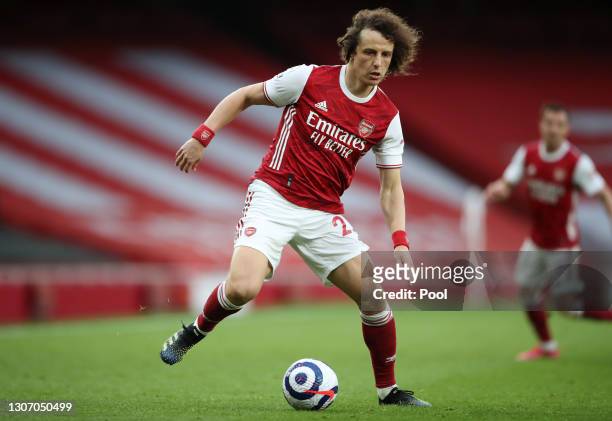 David Luiz of Arsenal controls the ball during the Premier League match between Arsenal and Tottenham Hotspur at Emirates Stadium on March 14, 2021...