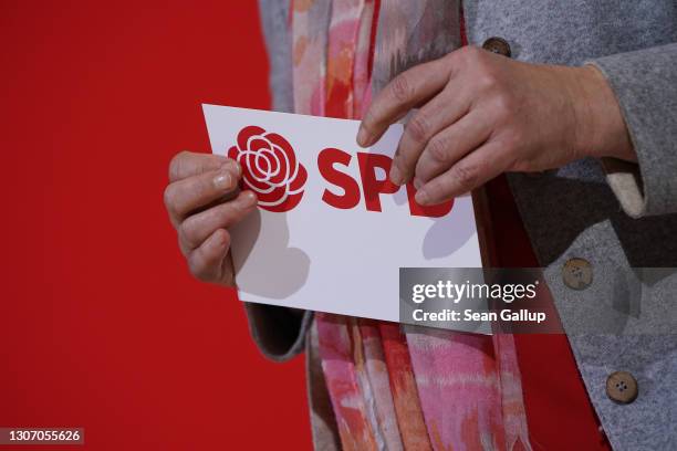 German Social Democrats party co-leader Saskia Esken uses a notecard as she speaks to the media following initial results for elections in the states...