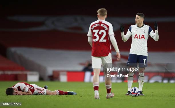 Erik Lamela of Tottenham Hotspur reacts after being shown a red card following a foul on Kieran Tierney of Arsenal during the Premier League match...