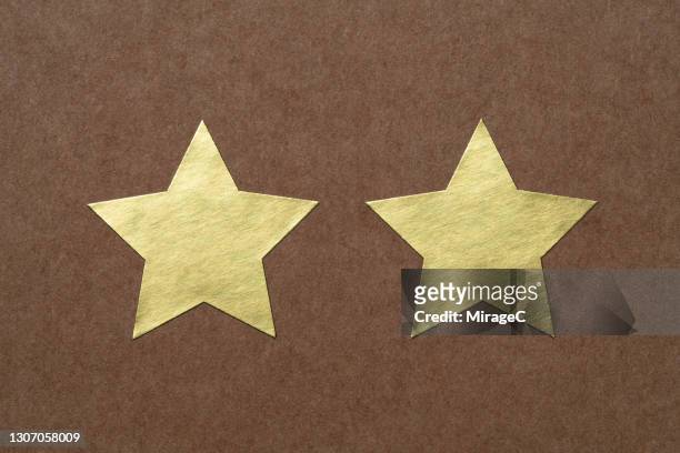 gold star shaped stickers - star shape stock pictures, royalty-free photos & images