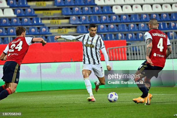 Cristiano Ronaldo of Juventus scores his goalduring the Serie A match between Cagliari Calcio and Juventus at Sardegna Arena on March 14, 2021 in...