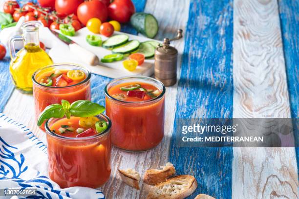 gazpacho andaluz cold tomato soup recipe in a glass from andalusian spain - gazpacho stock pictures, royalty-free photos & images