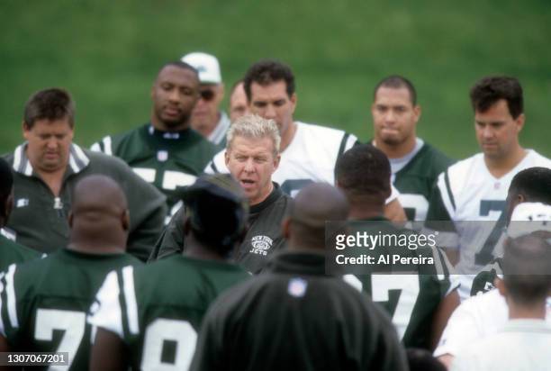 New York Jets Head Coach Bill Parcells coaches his team during practice at the New York Jets Training Facility Complex on June 10, 1998 in Hempstead,...