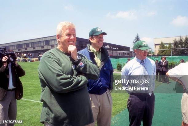 New York Jets Head Coach Bill Parcells coaches his team during practice alongside Governor George Pataki and Team Owner Wood Johnson at the New York...