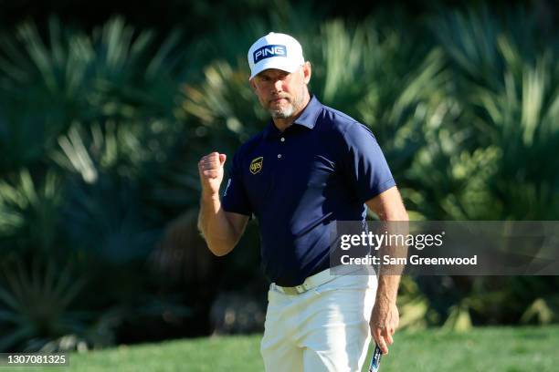 Lee Westwood of England reacts to his birdie on the 14th green during the final round of THE PLAYERS Championship on THE PLAYERS Stadium Course at...