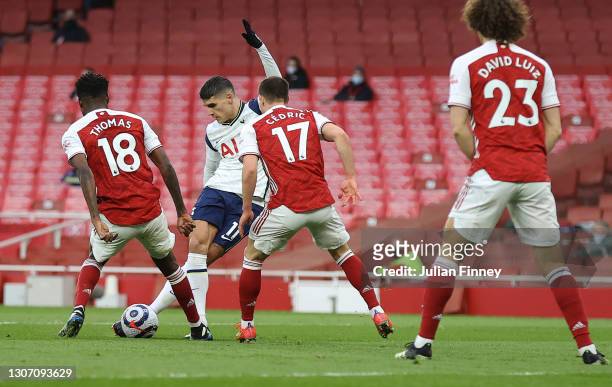 Erik Lamela of Tottenham Hotspur scores their side's first goal with a Rabona during the Premier League match between Arsenal and Tottenham Hotspur...