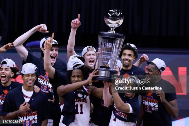 The Illinois Fighting Illini hold up the Big Ten Basketball Championship trophy with a win over the Ohio State Buckeyes in the Big Ten Basketball...