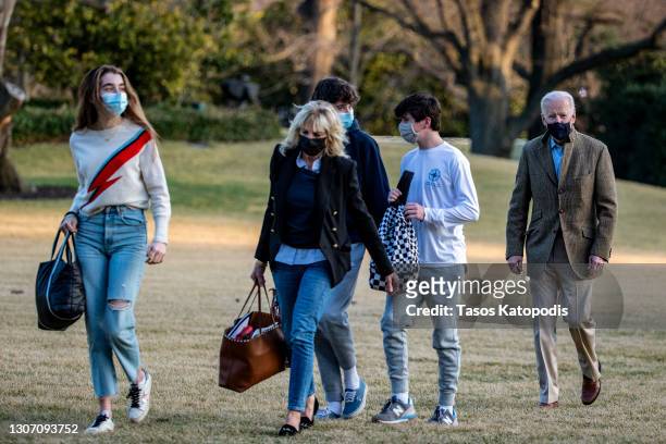 Natalie Biden, First Lady Dr. Jill Biden, U.S. President Joe Biden, Hunter Biden and family friend walk on the South Lawn of the White House on March...