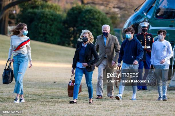 Natalie Biden, First Lady Dr. Jill Biden, U.S. President Joe Biden, Hunter Biden and family friend walk on the South Lawn of the White House on March...