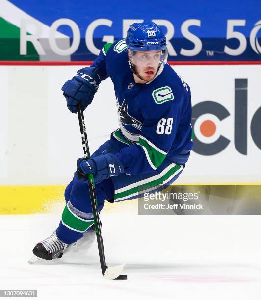 Nate Schmidt of the Vancouver Canucks skates up ice during their NHL game against the Edmonton Oilers at Rogers Arena on March 13, 2021 in Vancouver,...