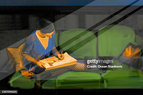 young woman drawing in coffee shop - one woman different roles drawing stock illustrations