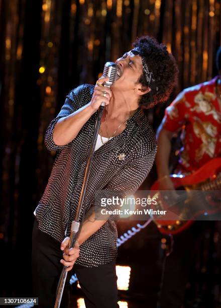 In this image released on March 14, Bruno Mars performs onstage during the 63rd Annual GRAMMY Awards at Los Angeles Convention Center in Los Angeles,...