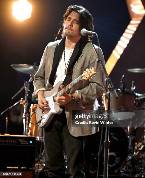 In this image released on March 14, John Mayer performs onstage during the 63rd Annual GRAMMY Awards at Los Angeles Convention Center in Los Angeles,...