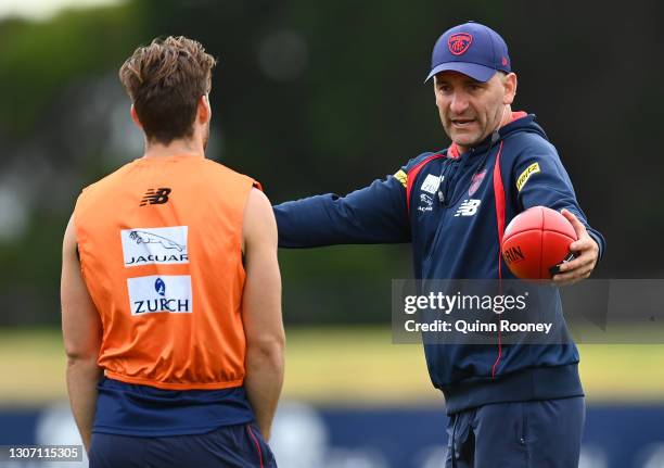 Demons assistant coach Adem Yze speaks to Jack Viney of the Demons during a Melbourne Demons AFL training session at Casey Fields on March 15, 2021...