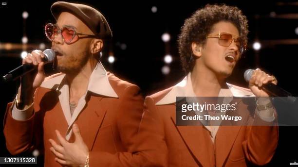 In this screengrab released on March 14, Anderson .Paak and Bruno Mars of music group Silk Sonic perform onstage during the 63rd Annual GRAMMY Awards...