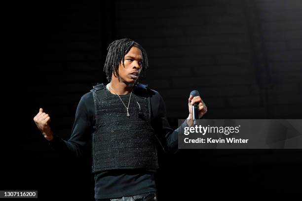 In this image released on March 14th, Lil Baby performs at the 63rd Annual GRAMMY Awards broadcast on March 14th, 2021.