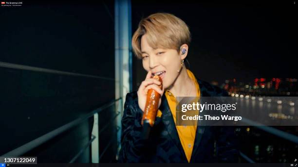 In this screengrab released on March 14, Jimin of music group BTS performs onstage during the 63rd Annual GRAMMY Awards broadcast on March 14, 2021.