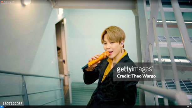 In this screengrab released on March 14, Jimin of music group BTS performs onstage during the 63rd Annual GRAMMY Awards broadcast on March 14, 2021.