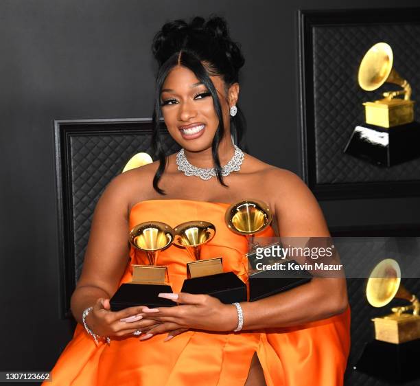 Megan Thee Stallion, winner of the Best Rap Performance and Best Rap Song awards for 'Savage' and the Best New Artist award, poses in the media room...