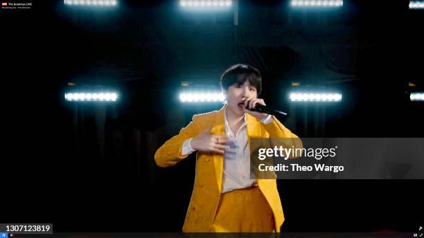 In this screengrab released on March 14, Suga of BTS performs onstage during the 63rd Annual GRAMMY Awards broadcast on March 14, 2021.