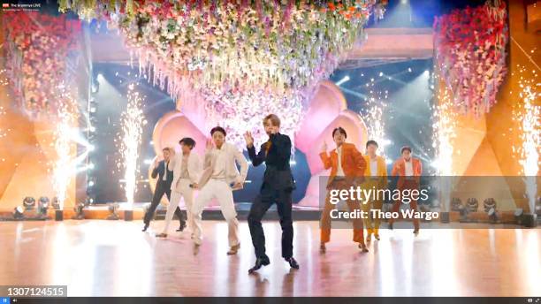 In this screengrab released on March 14, RM, V, Jungkook, Jimin, J-Hope, Suga, and Jin of BTS perform onstage during the 63rd Annual GRAMMY Awards...