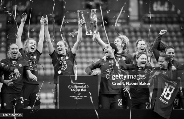 Magdalena Erkisson of Chelsea and Millie Bright of Chelsea lift the trophy after their teams victory during the FA Women's Continental Tyres League...