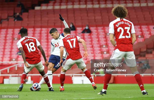 Erik Lamela of Tottenham Hotspur scores his side's first goal with a 'rabona' during the Premier League match between Arsenal and Tottenham Hotspur...