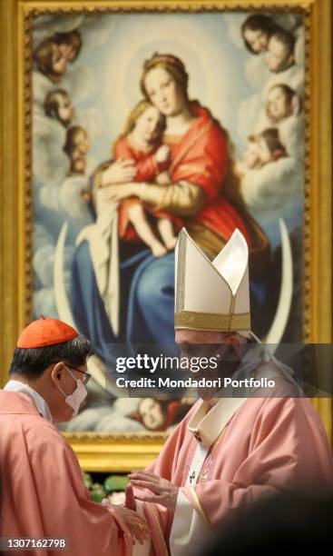 Cardinal Luis Antonio Tagle, Prefect of the Congregation for the Evangelization of Peoples, greets Pope Francis during the Holy Mass in St. Peter's...