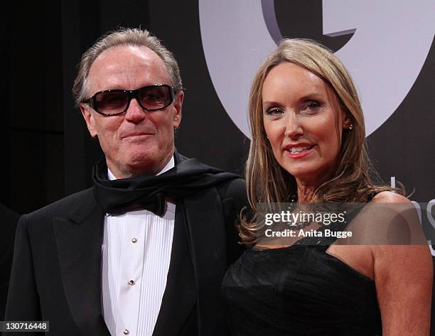 Peter Fonda and his wife Portia Rebecca Crockett attend the GQ Man Of The Year Award 2011 at the Konzerthaus Berlin on October 28, 2011 in Berlin,...