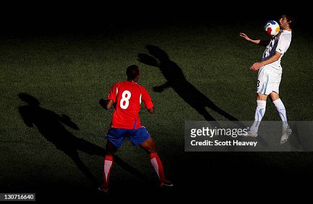 Gaston Alexis Silva of Uruguay in action with Jorge Alexander Davis of Costa Rica during the Men's Football Bronze Medal match between Costa Rica and...