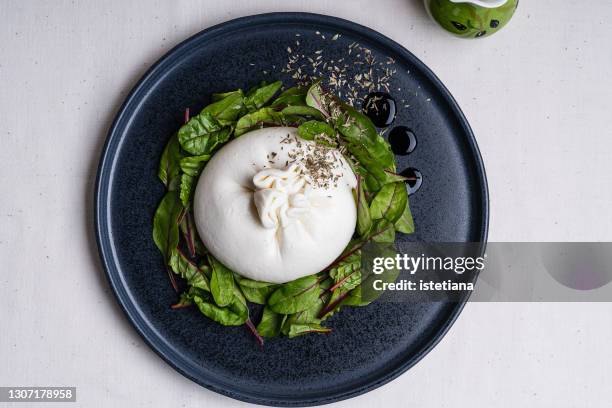 salad with burratta cheese, mangold and balsamic vinegar - burrata stock pictures, royalty-free photos & images