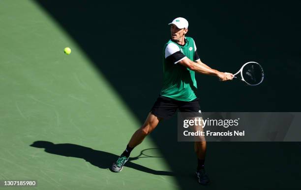 John Millman of Australia returns a backhand during the Round of 64 Men's Single's match between Bernabe Zapata Miralles and John Millman on Day Nine...