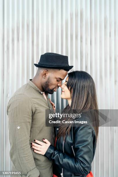 jose manuel de lago panadero - black men kissing white women stock-fotos und bilder
