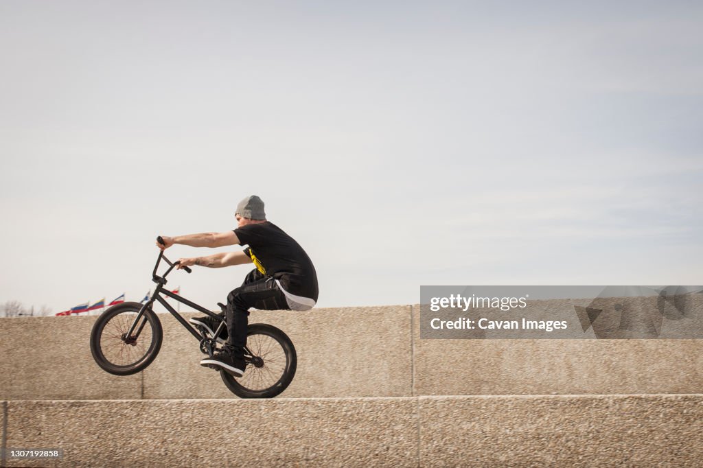 Young bmx rider trying to land trick