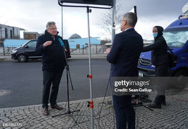 Joerg Meuthen, co-leader of the Alternative for Germany political party, speaks to a television crew the day after elections in the states of...