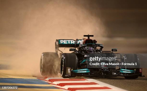 Lewis Hamilton of Great Britain driving the Mercedes AMG Petronas F1 Team Mercedes W12 drives shortly after a sandstorm during Day Two of F1 Testing...