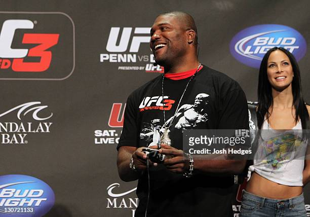 Former UFC champion Quinton "Rampage" Jackson plays the UFC Undisputed 3 video game on stage before the UFC 137 weigh-in at the Mandalay Bay Events...