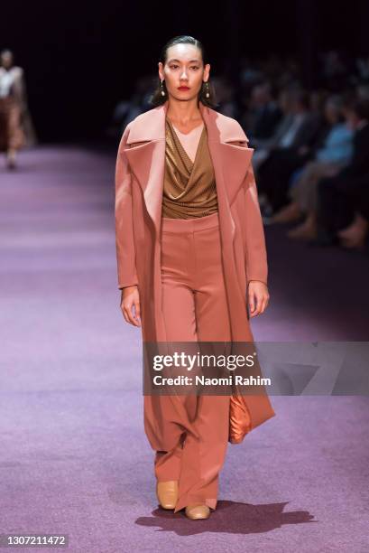 Model showcases designs by Bianca Spender during Runway 2 at Melbourne Fashion Festival at National Gallery of Victoria on March 15, 2021 in...
