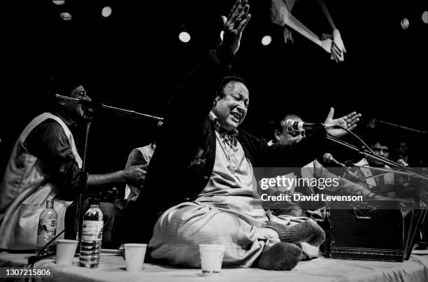 Nusrat Fateh Ali Khan, at the WOMAD festival in Reading, UK, on July 17, 1993. He was a Pakistani vocalist, musician and music director primarily a...