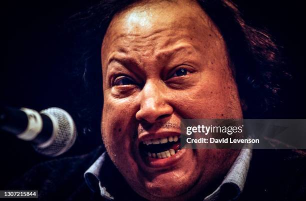 Nusrat Fateh Ali Khan, at the WOMAD festival in Reading, UK, on July 17, 1993. He was a Pakistani vocalist, musician and music director primarily a...