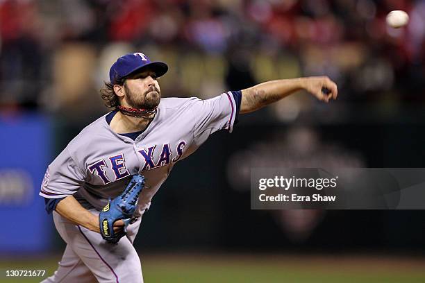 Wilson of the Texas Rangers pitches in the sixth inning during Game Seven of the MLB World Series against the St. Louis Cardinals at Busch Stadium on...