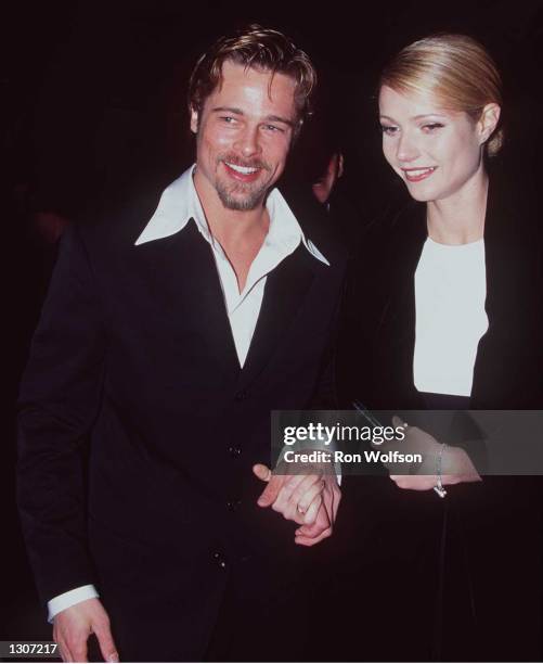 Brad Pitt and Gwyneth Paltrow arrive at the Golden Globe Awards at the Beverly Hilton in Beverly Hills, California January 21, 1996. On July 27 it...