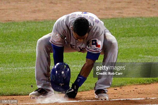 Elvis Andrus of the Texas Rangers reacts after flying out to end the top of the seventh inning during Game Seven of the MLB World Series against the...
