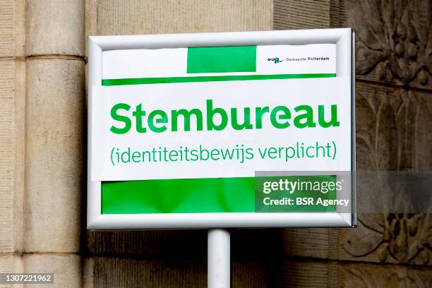 General view of a sign indicating a polling station in City Hall as Nederlanders go to the polls ahead of the 2021 Dutch General Election, on March...