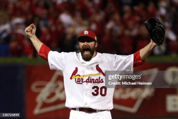 Jason Motte of the St. Louis Cardinals celebrates after defeating the Texas Rangers 6-2 to win the World Series during Game Seven of the MLB World...
