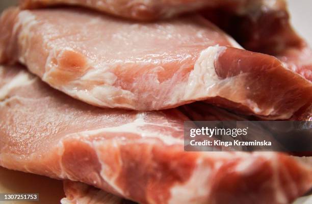 raw pork chops - loin stock pictures, royalty-free photos & images