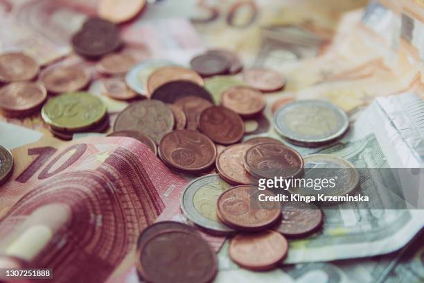euro currency, coins and notes, close up - money laundering foto e immagini stock