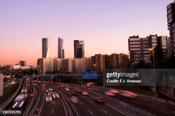 landscape at dusk of madrid with the four towers - madrid financial district stock pictures, royalty-free photos & images